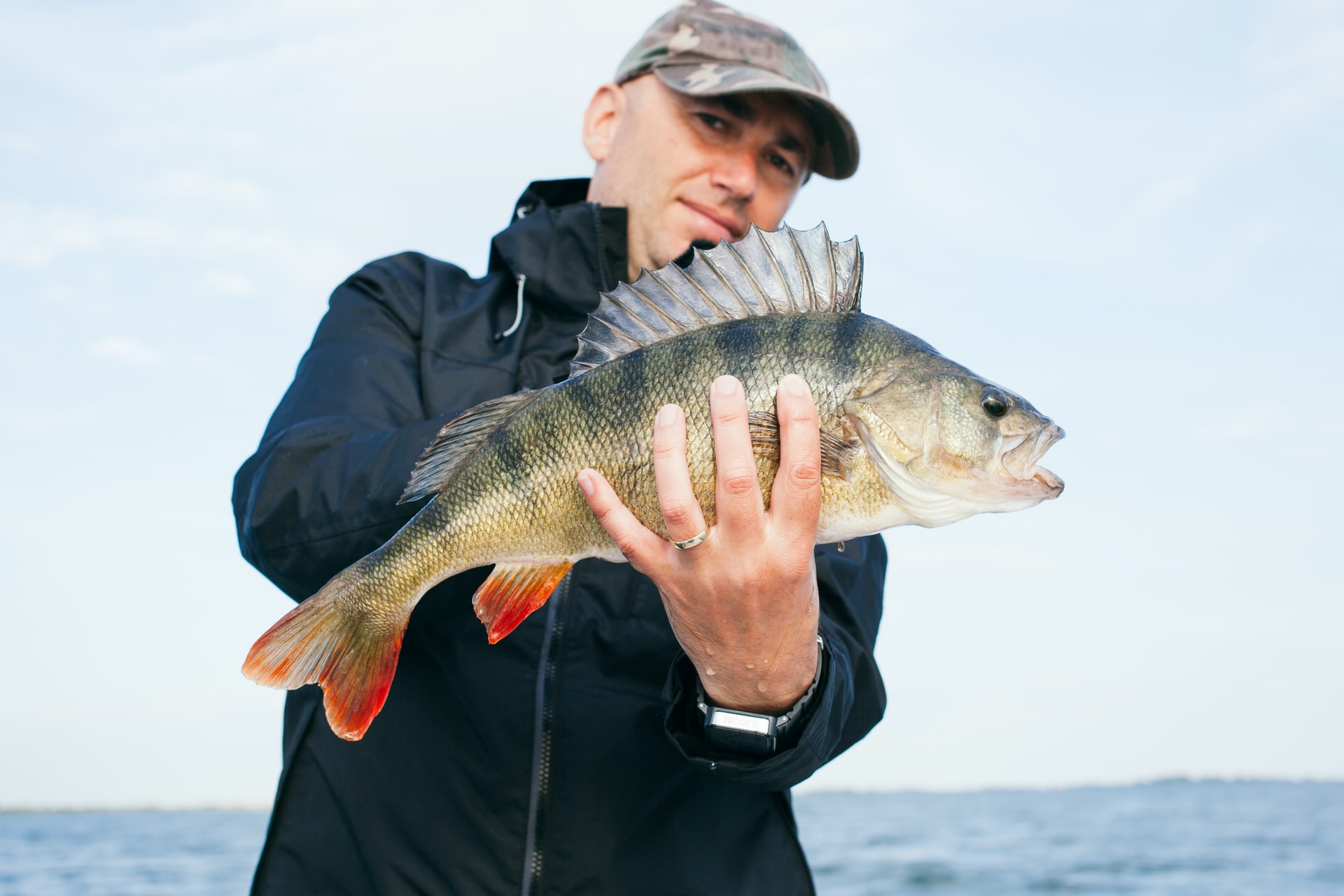 man holding fish