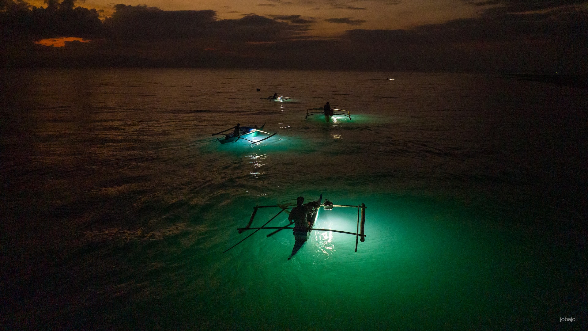 fishing boats at night