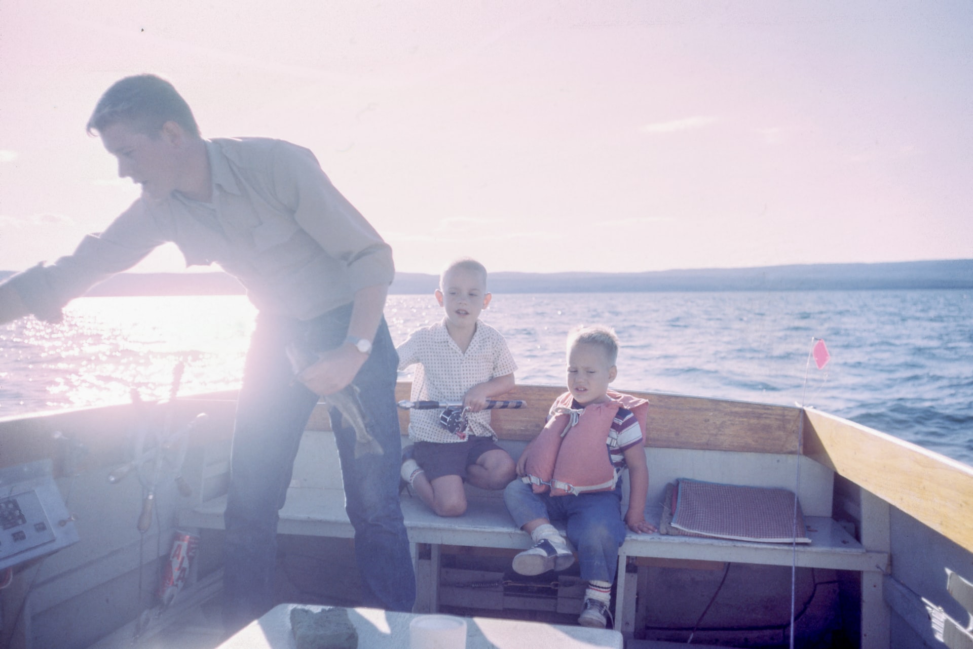 dad and sons on fishing trip