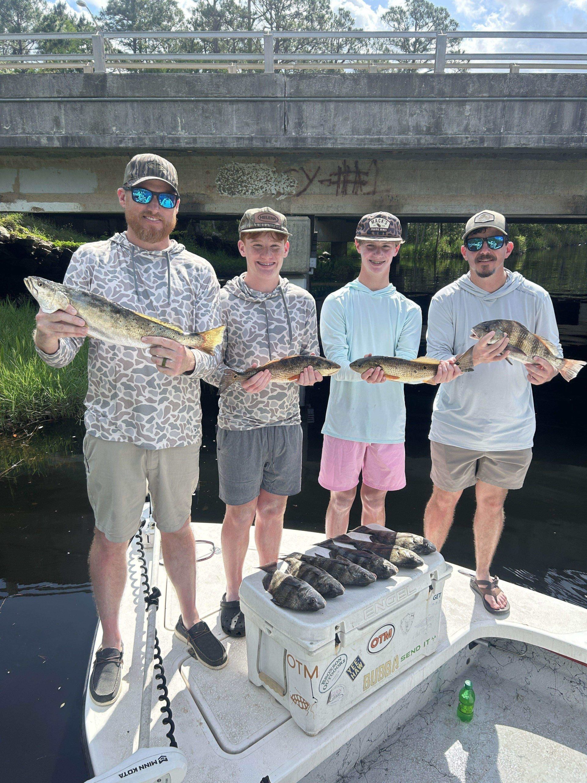 Redfish, speckled trout, and black drum caught in Pensacola Bay on May 24, 2025 with Showintail Inshore Charters