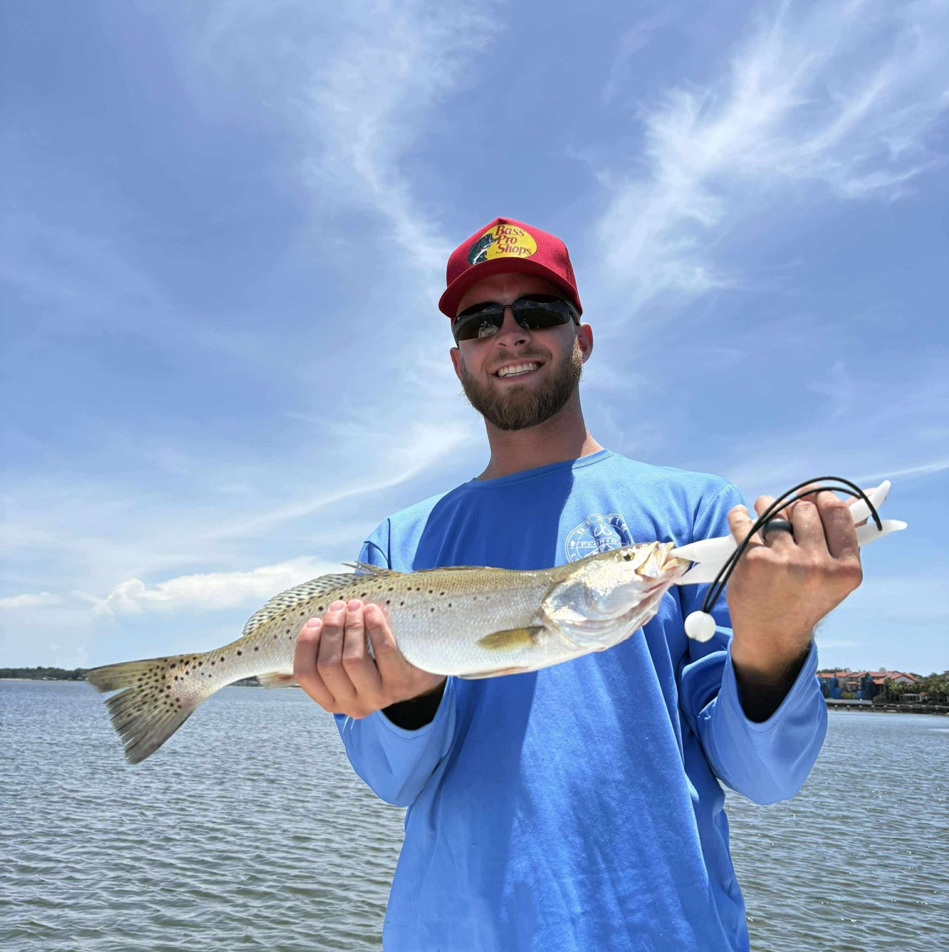 Angler with speckled trout caught on a Niceville inshore fishing charter with Showintail Inshore Charters