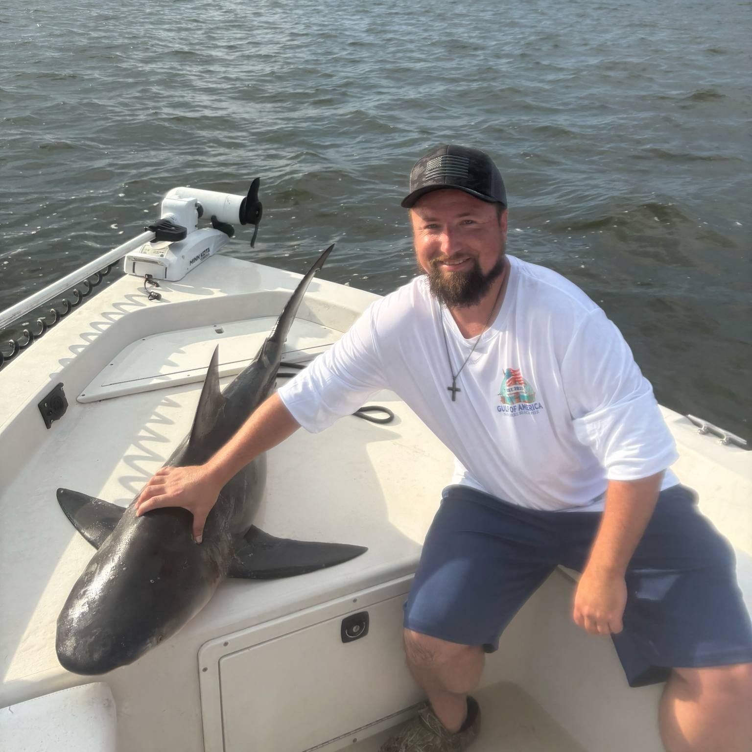 Navarre Beach shark fishing charter with Showintail Inshore Charters catching a large shark in Florida waters