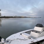 Showintail Inshore Charters boat cruising the calm waters of the Santa Rosa Sound near Navarre Beach.